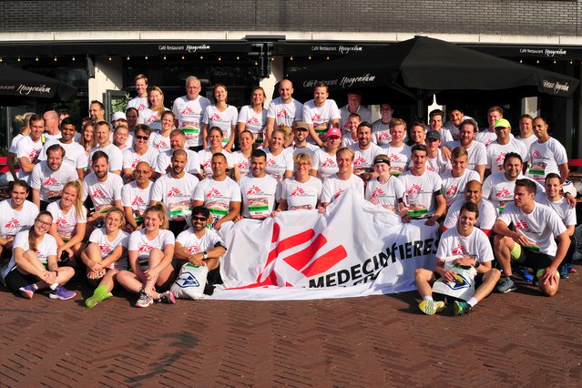 Groepsfoto deelnemers Dam tot Damloop 2019