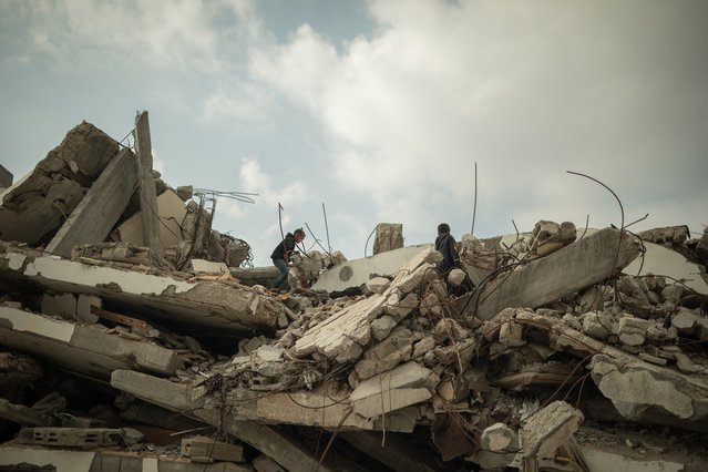 Kinderen in Gaza-Stad spelen op wat er over is van hun huis. © Motassem Abu Aser