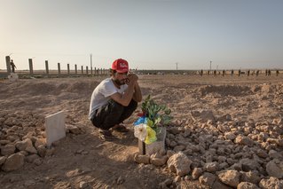 Tal Abyad. Ismael bitterly gathered at the grave of Hout, his friend and cousin, who died in combat less than 48 hours before.