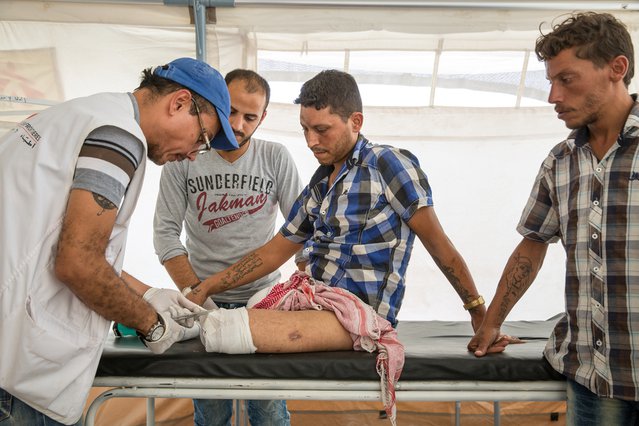 Man gewond in Raqqa, Syrie. Medische noodhulp Artsen zonder Grenzen
