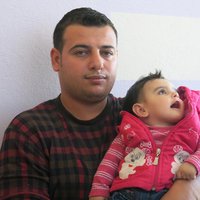 Syrische vluchteling met kind